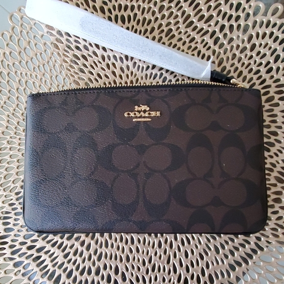 Coach Handbags - Coach signature wristlet - NWT